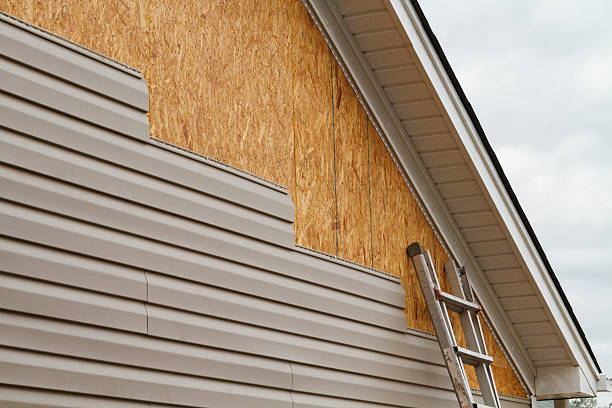 Professional Emergency Siding Repair technician working in Georgetown, CT